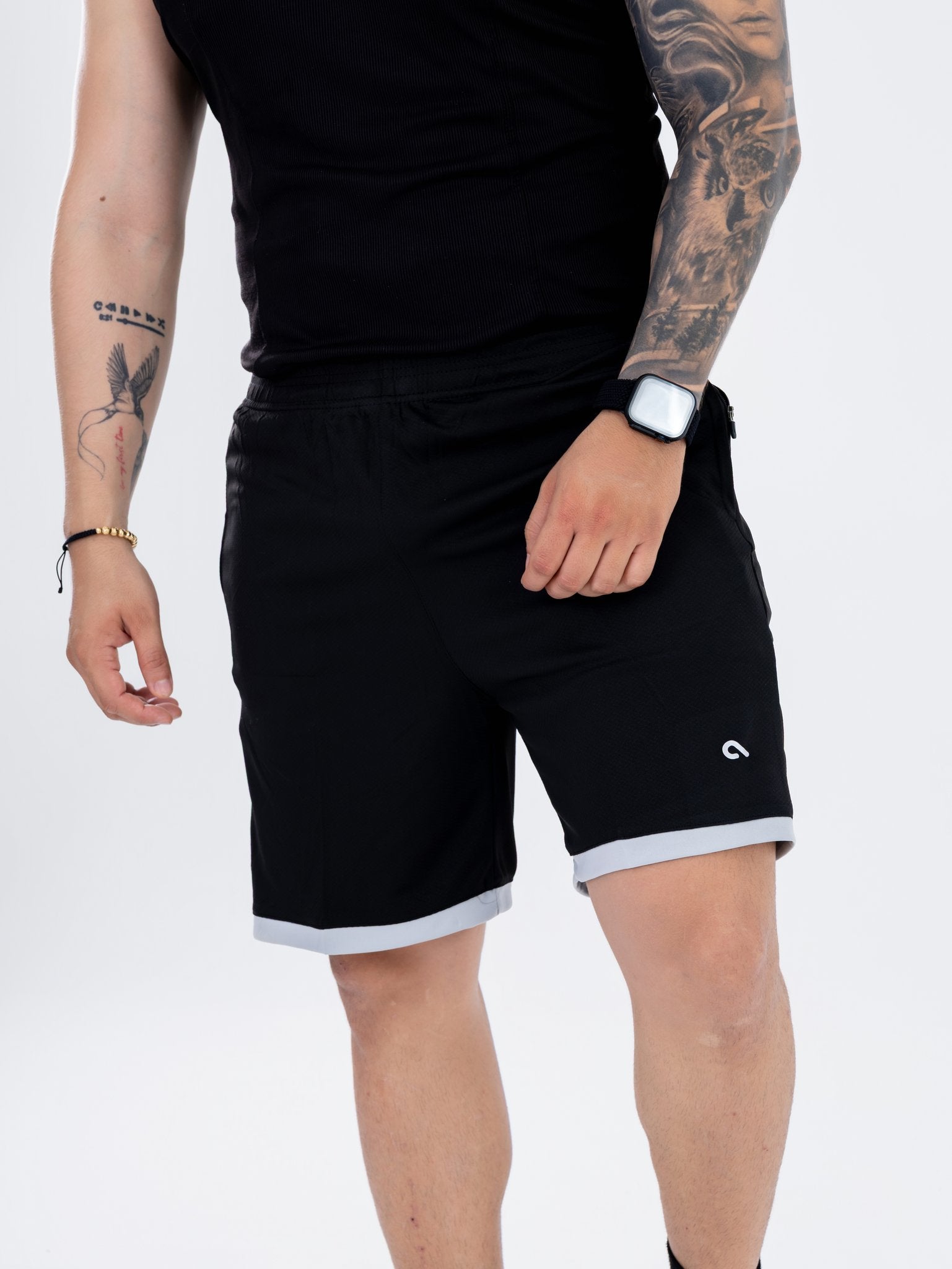 Pantaloneta Negra en Malla con Cremalleras