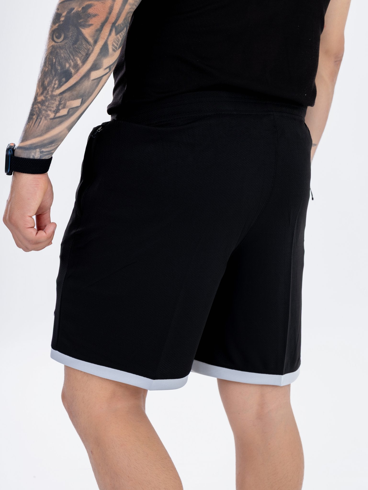 Pantaloneta Negra en Malla con Cremalleras
